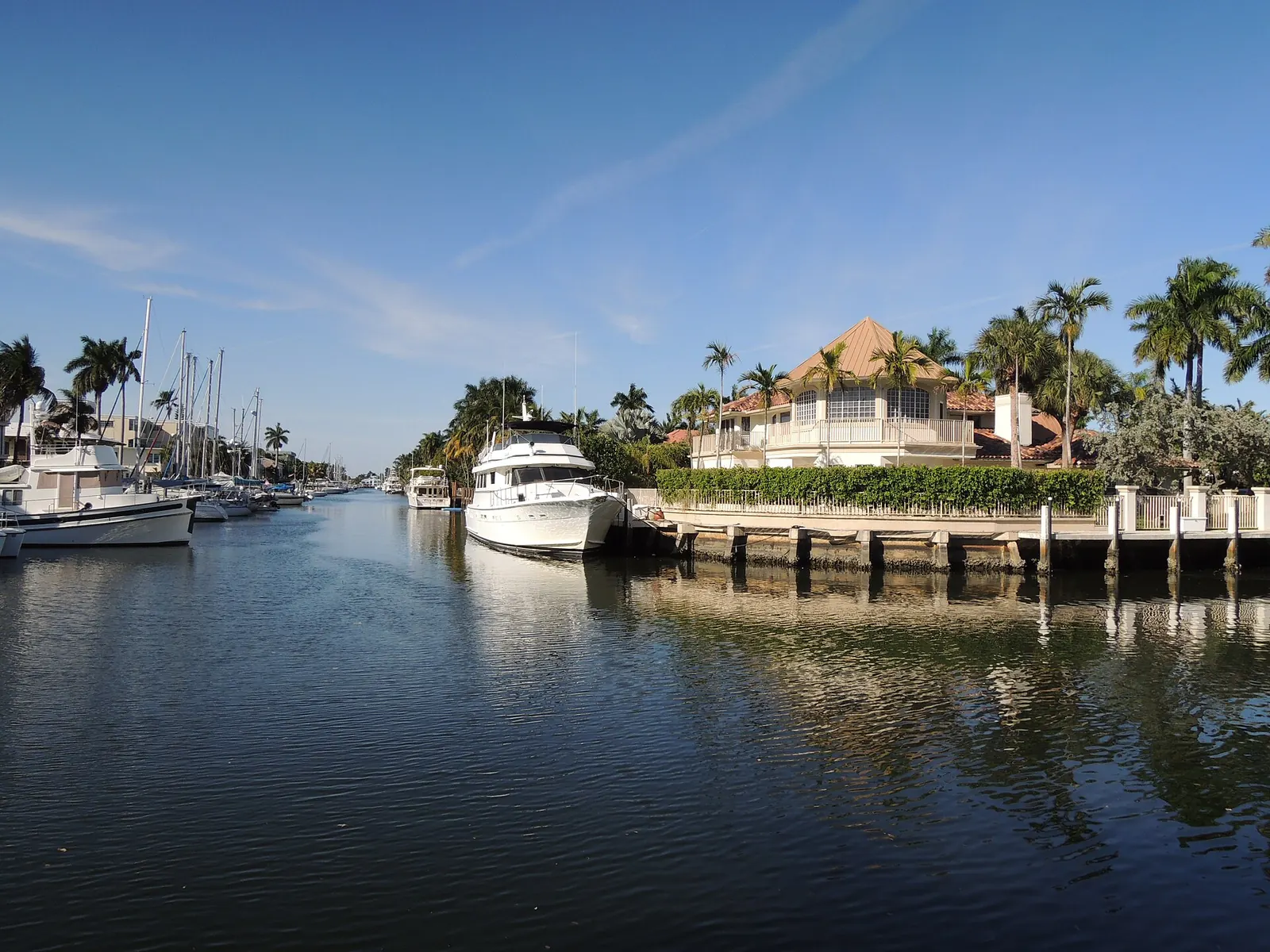 Waterfront house with a concrete seawall and private dock on a Fort Lauderdale canal